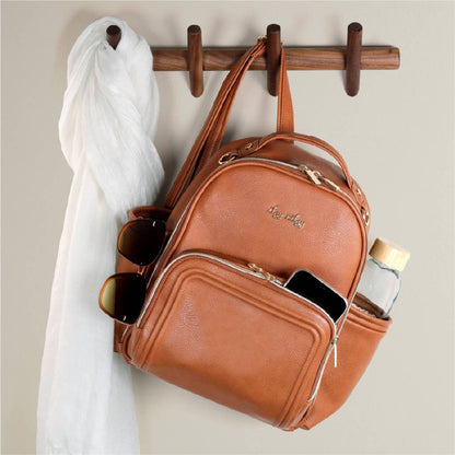Itzy Ritzy - Cognac Itzy Mini Plus™ Backpack Diaper Bag