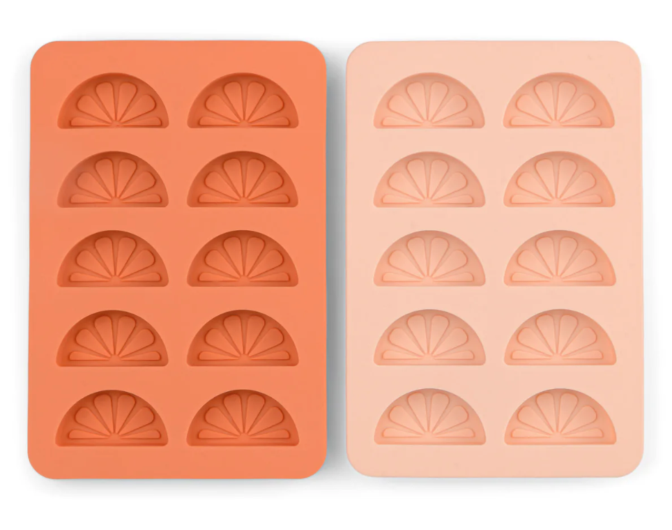 HERE'S HOW THE DOTTY CITRUS WEDGE ICE TRAYS - ORANGE + PINK