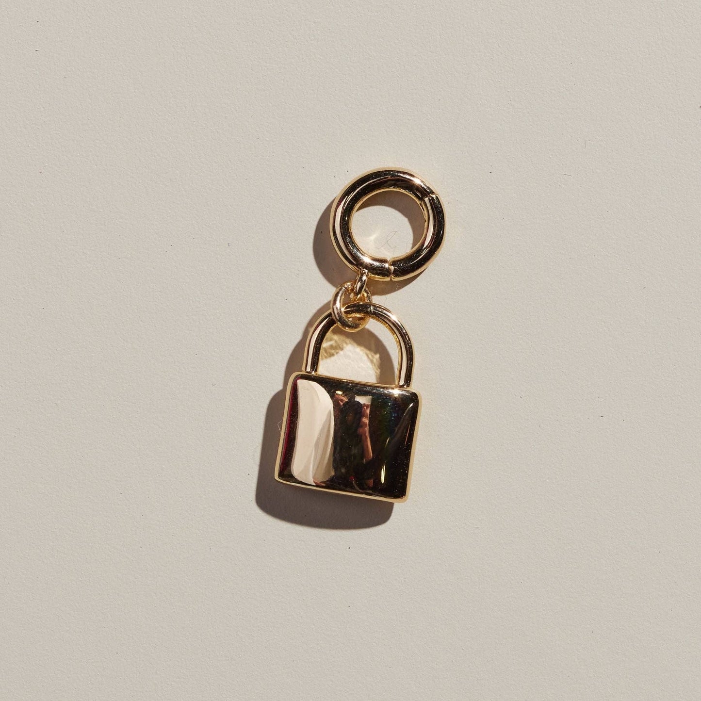 Nickel and Suede - Gold Lock Charm